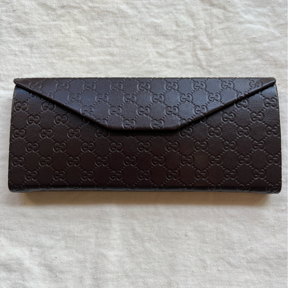 Gucci Dark Brown Embossed Eyeglasses/sunglasses case. Like new. Never used